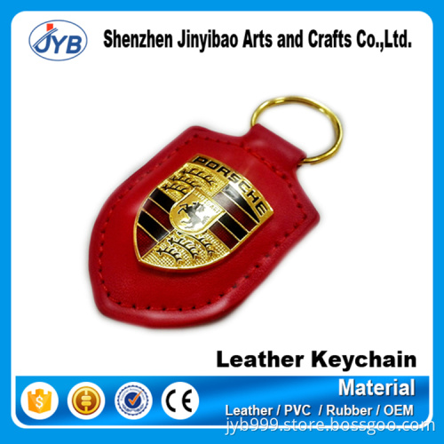 good quality red rubber name keychain shaped in shield